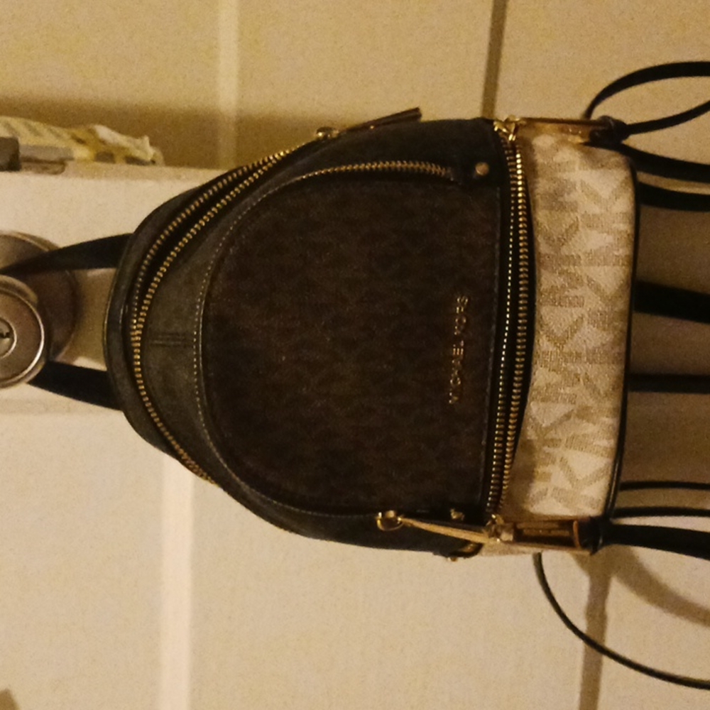 Practically new Michael kors mini backpack